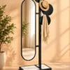 Movara mobile standing mirror with clothes hanger and black stainless steel frame