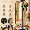 Movara mobile standing mirror with clothes hanger and black stainless steel frame