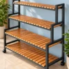 Norvik 4 tier rolling shoe rack with wooden-look slatted shelves and caster wheels