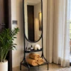 Onyx Arc black standing mirror with storage shelves and stainless steel frame