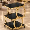 Orbit Luxe circular frame serving trolley with gold finish