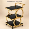 Orbit Luxe circular frame serving trolley with gold finish