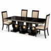 Orion black dining table with three gold sphere supports and four cream chairs