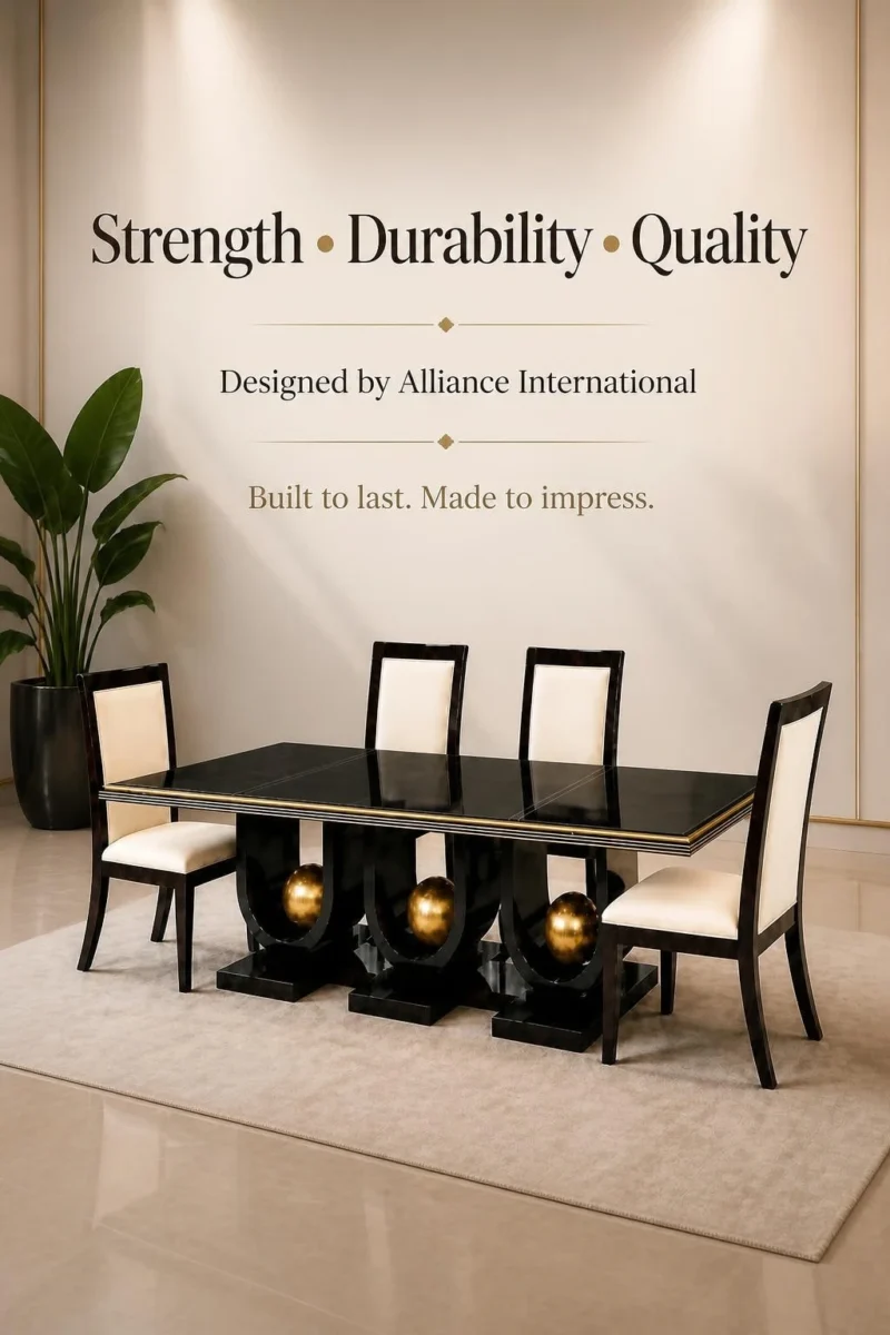 Orion black dining table with three gold sphere supports and four cream chairs