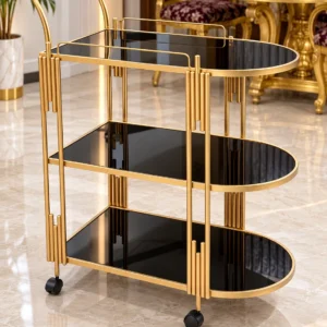 Orlena Luxe rounded edge serving trolley with gold frame and black serving surfaces