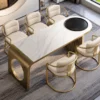 Orlena Luxe white marble dining table with gold base and upholstered chairs