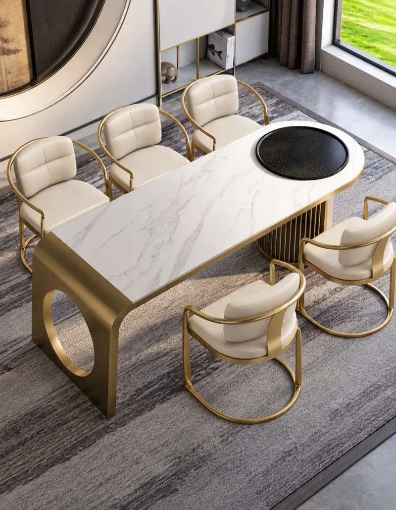 Orlena Luxe white marble dining table with gold base and upholstered chairs
