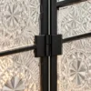 PrismFold Luxe folding premix glass partition with black frame