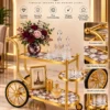 Regalia Wheel designer serving trolley with gold frame and large spoked wheel