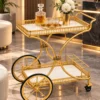 Regent Wheel 4 tier serving trolley with large spoked wheels and gold frame