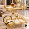 Regent Wheel 4 tier serving trolley with large spoked wheels and gold frame