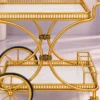 Regent Wheel 4 tier serving trolley with large spoked wheels and gold frame