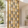 Ruby Drop decorative premix glass partition with Gold PVD grid