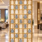 Ruby Drop decorative premix glass partition with Gold PVD grid