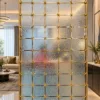 Stella Grid premix glass partition with Gold PVD frame