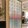 Stella Grid premix glass partition with Gold PVD frame