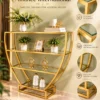 Velora hourglass cosmetic display rack with curved gold frame and three open shelves