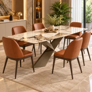 Veyra Cross marble dining table with dark sculptural base and four upholstered chairs
