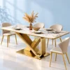 Veyra Loop geometric marble dining table with gold stainless steel base