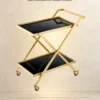 Veyra Luxe X frame serving trolley with gold finish