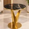 Veyra V black marble side table with sculptural gold base