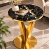 Veyra V black marble side table with sculptural gold base
