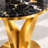 Veyra V black marble side table with sculptural gold base