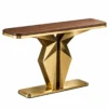 Veyron Geo geometric gold console table with faceted pedestal base and wood-look top