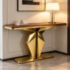 Veyron Geo geometric gold console table with faceted pedestal base and wood-look top