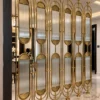 Arcelle Deco fluted glass partition used as decorative foyer divider
