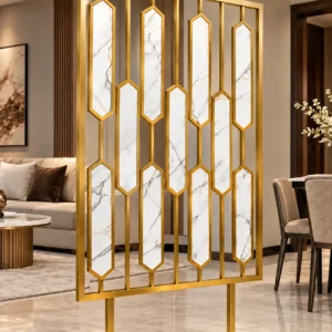 Hexara luxury room partition with geometric gold PVD design in modern interior