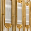 Close view of Arcelle Deco gold stainless steel frame and vertical fluted glass