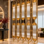 Arcelle Deco gold arched fluted glass room divider in modern interior
