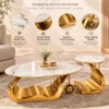 Aurelia gold marble centre table set feature graphic showing premium marble tops, sculptural stainless steel bases and gold sphere detail.
