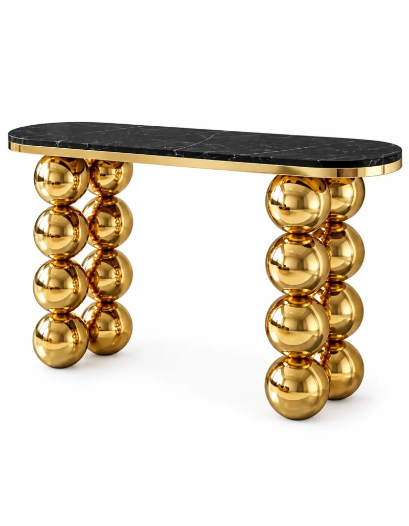 Aureon Luxe black marble console table with gold stainless steel edging and two sculptural stacked sphere leg supports on white background.