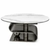 Aureon black marble centre table with round white marble top, sculptural S-curve stainless steel base and decorative black sphere.