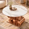 Top-angle view of round white marble coffee table with natural grey veining and decorative S-curve base.