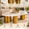 Auresto Luxe oval marble centre table with white veined marble top and three gold stainless steel cylindrical legs in a promotional features graphic.