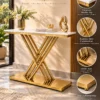 Aurexis Luxe gold stainless steel console table with white marble top, intersecting X-shaped rods and product feature callouts.