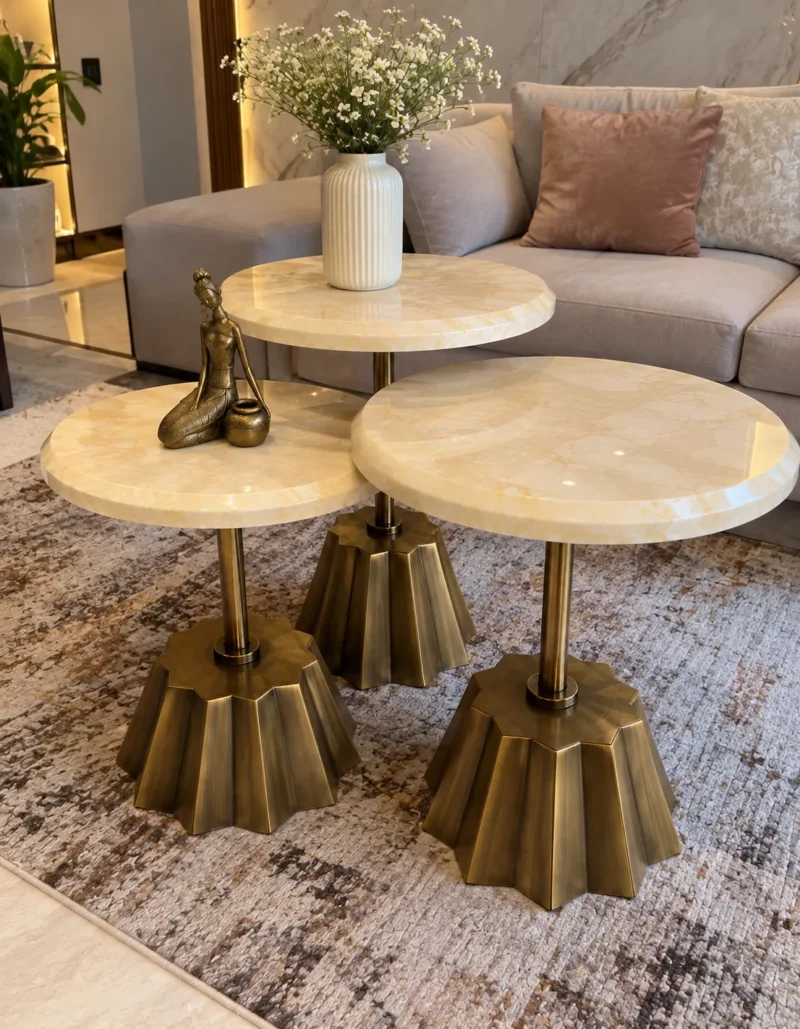 Luxury 3 piece marble side table set with gold pedestal bases in living room