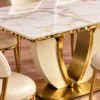 Close up of marble dining table top and gold stainless steel base