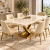Cream marble dining table with gold veining and matching upholstered dining chairs