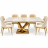 Cresvella Luxe marble dining table set with gold X shaped base and cream upholstered chairs