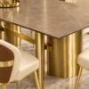 Close up of brown marble dining table and cylindrical stainless steel base
