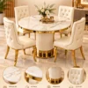 Eloria fluted pedestal marble dining table with upholstered chairs