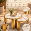 Elvoria Luxe marble nesting centre table set of 2 with white marble tops and gold stainless steel frames in a product features graphic.