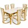 Elyra marble dining table with six gold chairs on white background