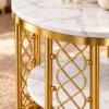 Close-up of white marble veining and gold steel lattice with spherical accents