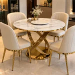 Modern 4 seater marble dining set with gold stainless steel loop pedestal in luxury home