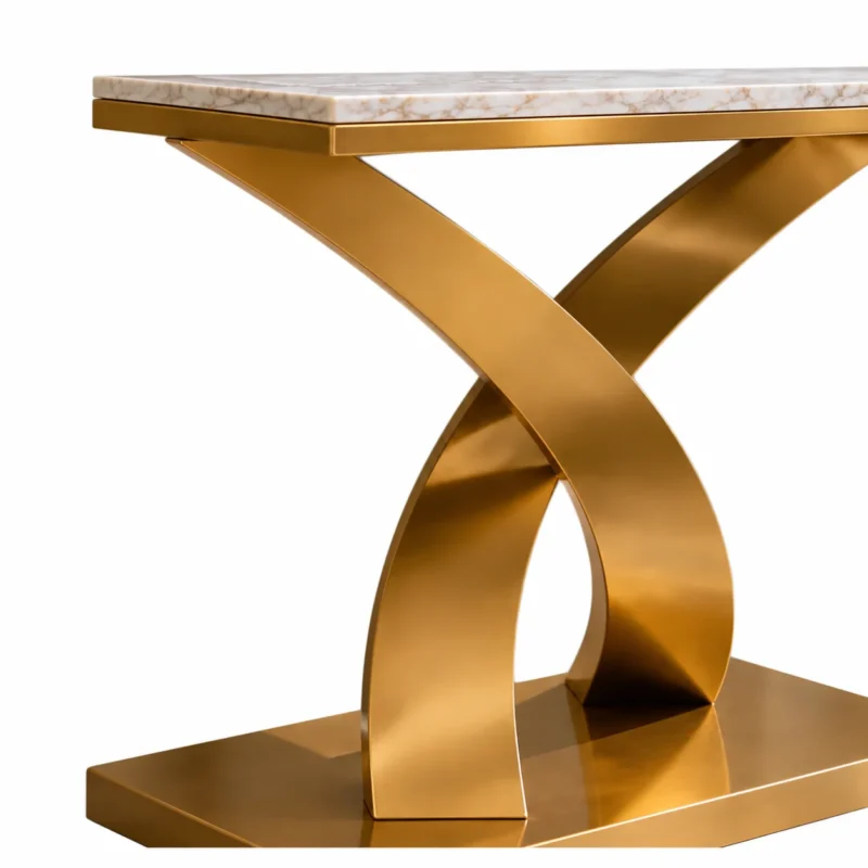 Close-up of curved gold stainless steel X base beneath marble console tabletop